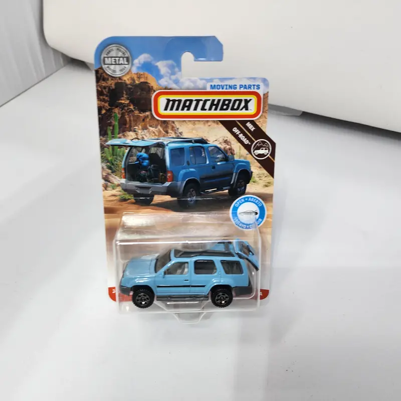 2000 Nissan Xterra * Light Blue * Matchbox Moving Parts 1