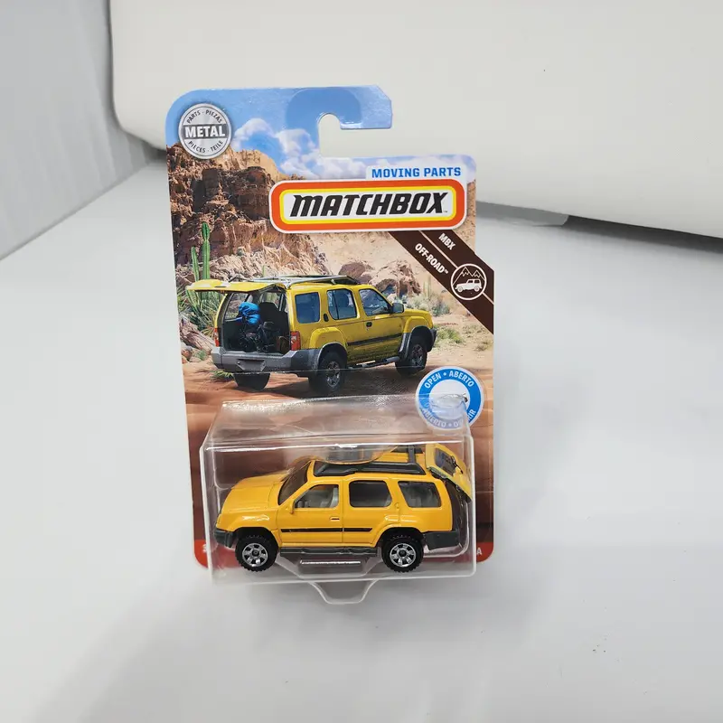 2000 Nissan Xterra * Yellow * Matchbox Moving Parts 1