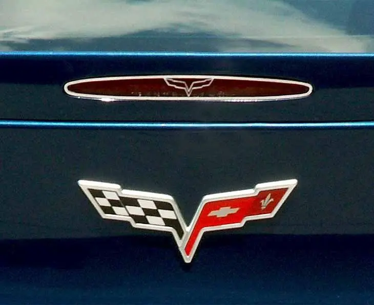 2005-2013 C6 Corvette - 5Th Brake Light Trim Crossed Flags Style | Polished Stainless Steel 1