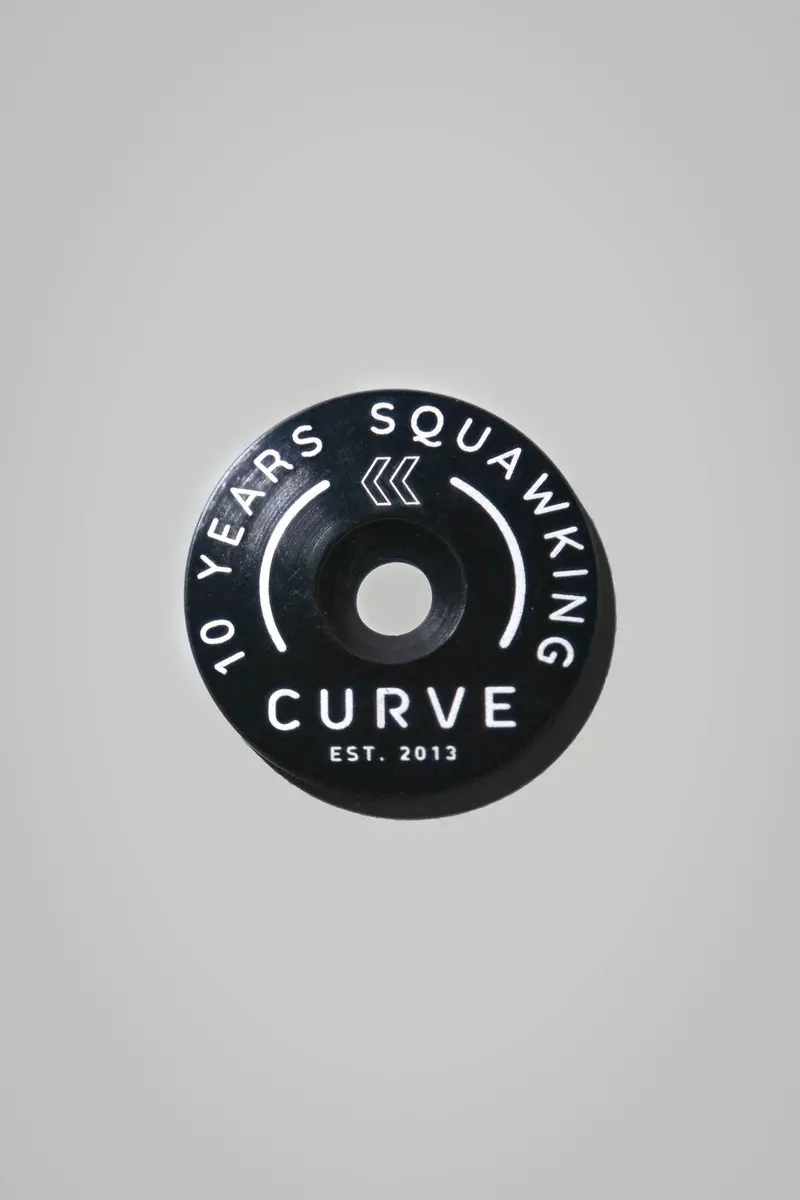 Curve 10 Year Anniversary Topcap 1