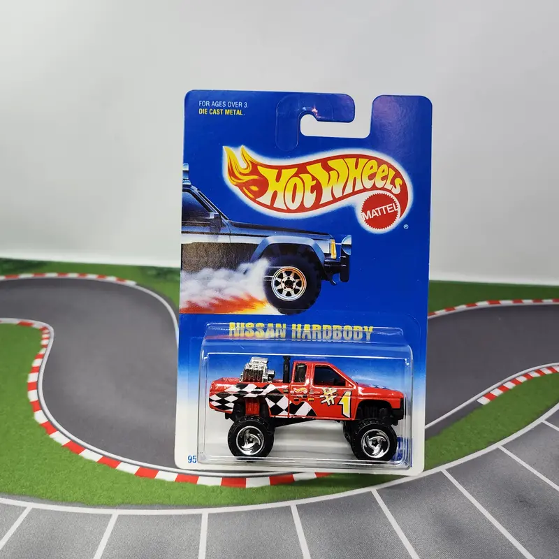 Nissan Hardbody #131 * Red W/ Razor Rims * Hot Wheels Blue Card 1