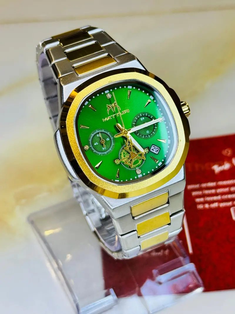 Two Tone Emerald Matturi Chronograph Nautilus Watch 1